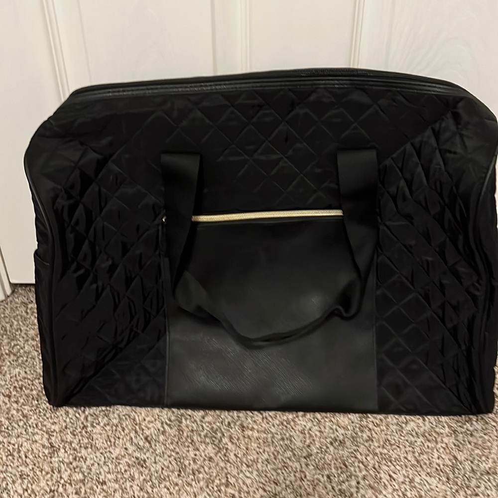 Black nylon travel bag never used